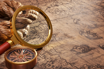 map and magnifying glass - 65059247