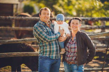 Young happy family having fun at countryside