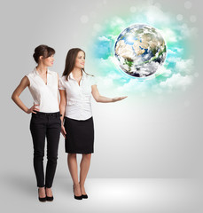 Young woman with earth and cloud concept