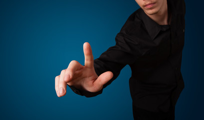 Businessman pressing imaginary button