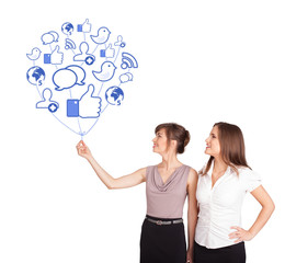 Happy ladies holding social icon balloon