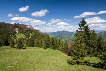 Amazing spring mountain landscape with blue sky and clouds © Jaroslav Machacek