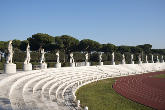 Fototapeta Marble statues in the Stadio dei Marmi, Rome Italy.