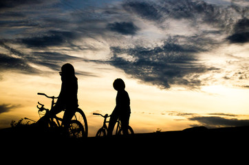 Fototapeta na wymiar silhouette of tow biker