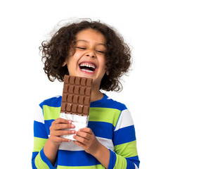 Little girl eating chocolate