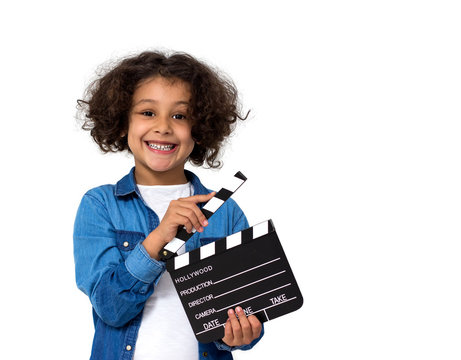 Little girl with movie slate