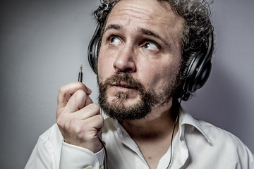 Funny, man with intense expression, white shirt