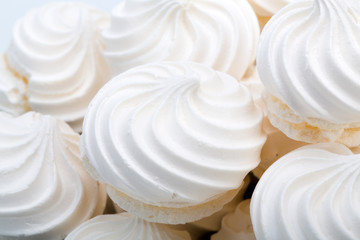 French vanilla meringue cookies on white background