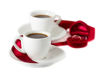 Wedding still life, wedding rings, cups of coffee