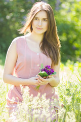 Portrait of a beautiful young woman with brown hair