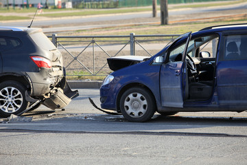 Accident involving two cars at a crosswalk