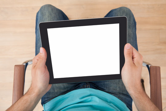 Man Holding Digital Tablet With Blank Screen