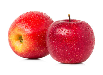 Red apples with water drops isolated