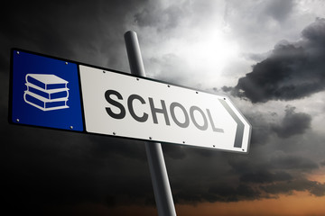 Obraz premium School direction. Blue traffic sign.