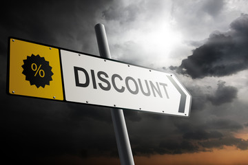 Obraz premium Discount direction. Yellow traffic sign.
