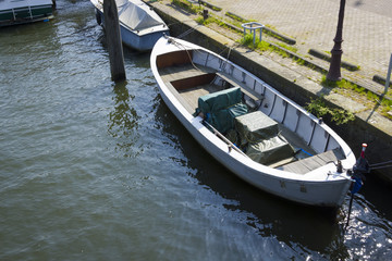 Fototapeta na wymiar Boat at the canal, Amsterdam