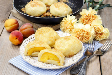 Naklejka na ściany i meble Peach in pastry, popular austrian dish. Garden party table