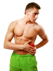 Young man having pain in his back, isolated on white background