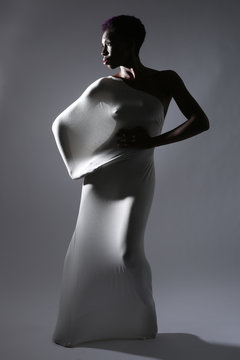 Shapely Woman in Creative Light and Spandex Fabric
