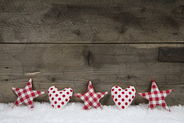 Frohe Weihnachten: rustikaler Hintergrund aus Holz in rot weiß