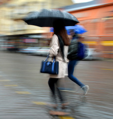 People walking down the street in rainy day