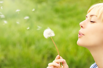 Woman with dandelion