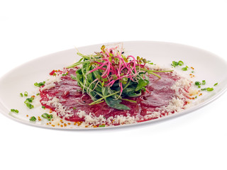 beef carpaccio with rocket salad