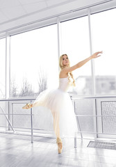 Beautiful balerina practicing in ballet class © Africa Studio