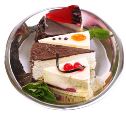 Assortment of pieces of cake, isolated on white © Africa Studio