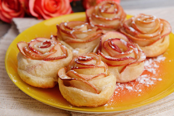 Obraz na płótnie Canvas Tasty puff pastry with apple shaped roses