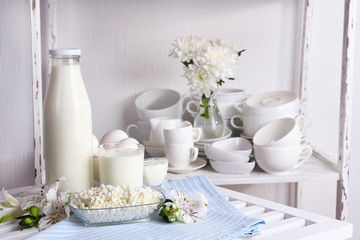 Still life with tasty dairy products on table