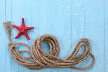 rope  starfish on blue  background
