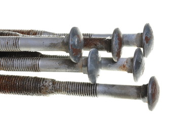 Old screws head bolts, isolated on white background