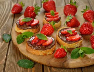 Toast with chocolate and strawberries