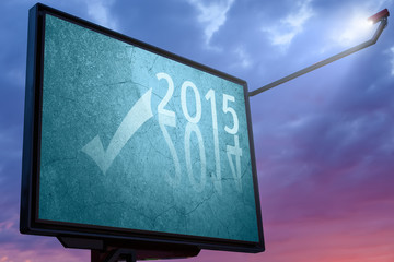 Billboard at sunset with a text message for 2015