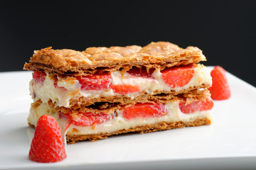 French gourmet strawberry mille feuille with whipped sour cream.