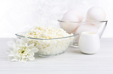 Tasty dairy products on wooden table