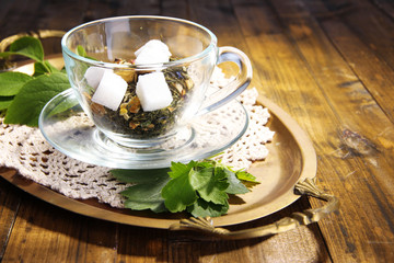 Glass cup with dry flowers and herbs, fruits ingredients for