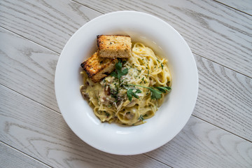 Carbonara on the wood table