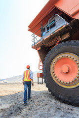 Worker Big Truck in Pit