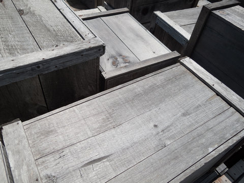 Wooden boxes at a harbor