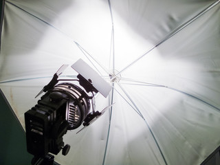 Floodlight and reflective umbrella at a film studio