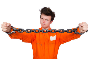 Young inmate with chains isolated on the white