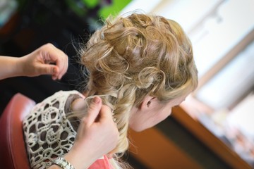 Fototapeta premium Bride at the hairdresser