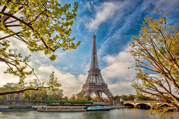 Naklejka na ściany i meble Eiffel Tower with boat on Seine in Paris, France