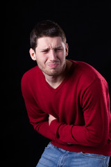 Fototapeta premium Man suffering from stomach ache