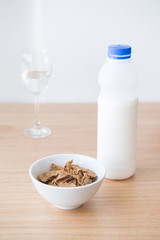 Corn flake and bottle of milk ready for breakfast