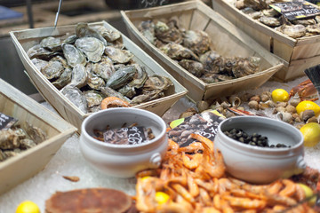 Oysters and shrimps for sale in fish market