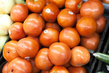 Tomatoes for sale at a market stall