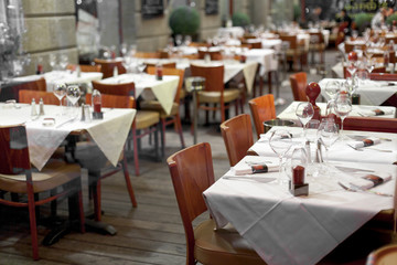 Tables at sidewalk cafe, Cancale, Ille-Et-Vilaine, Brittany, Fra